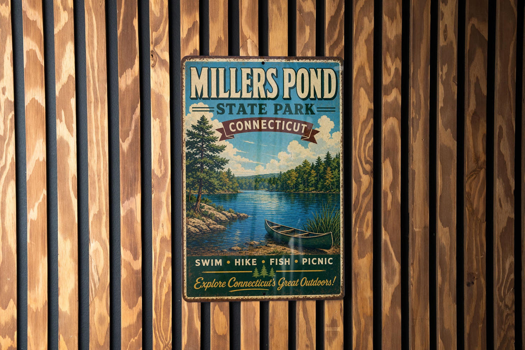A vintage metal sign for Miller's Pond State Park in Connecticut, featuring a scenic image of a lake with a canoe, surrounded by trees and mountains.