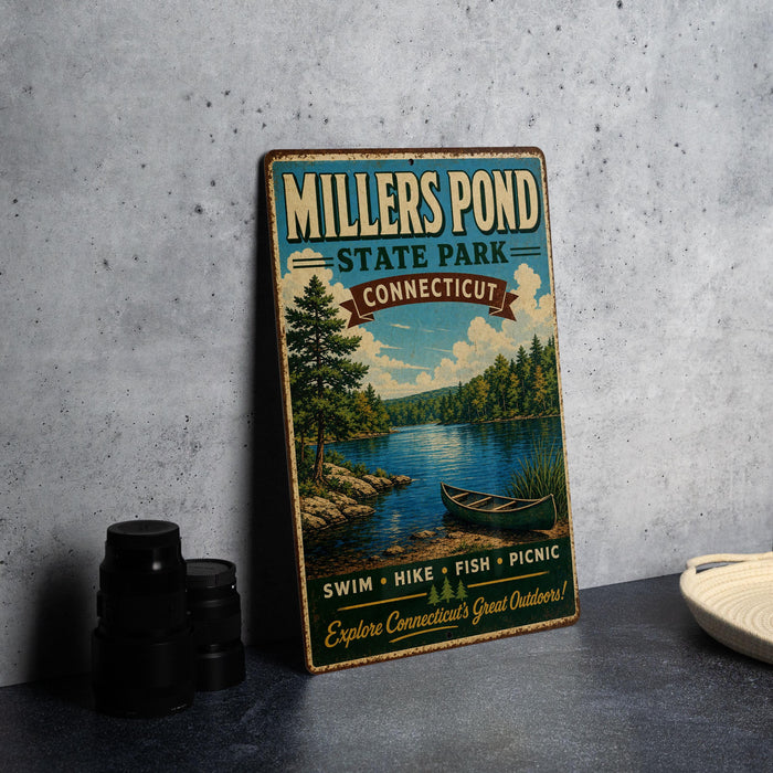 A vintage-style sign for Millers Pond State Park in Connecticut, featuring a scenic image of a lake, trees, and a canoe.