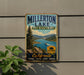 A vintage-style metal sign for Millerton Lake, California, featuring a scenic landscape with mountains, a lake, and a boat.