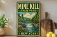A vintage-style sign for Mine Kill State Park in New York, featuring a scenic illustration of a waterfall and forest.