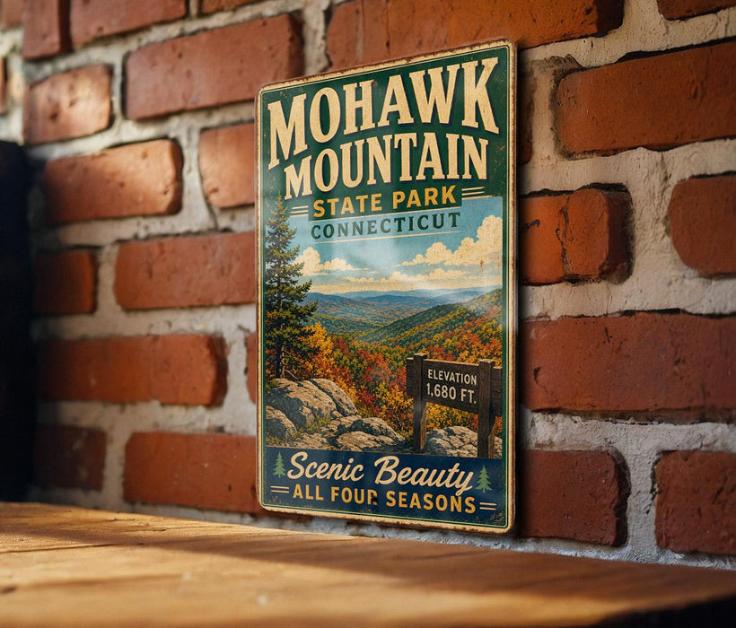 A vintage-style metal sign for Mohawk Mountain State Park in Connecticut, featuring a scenic mountain landscape with autumn foliage.