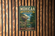 A vintage-style metal sign for Mohican State Park in Ohio, featuring a scenic landscape with a bridge and trees.