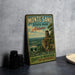 A vintage-style metal sign for Monte Sano State Park in Alabama, featuring a scenic image of a mountain and a lighthouse.