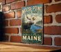 A vintage-style metal sign for Moose Point State Park in Maine, featuring a moose and a scenic landscape.