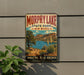 A vintage-style sign for Morphy Lake State Park in New Mexico, featuring a scenic landscape with mountains, a lake, and desert vegetation.