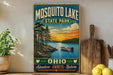 A vintage-style sign for Mosquito Lake State Park in Ohio, featuring a scenic landscape with a lake, trees, and a boat on the water.