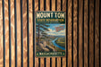 A vintage metal sign for Mount Tom State Reserve in Massachusetts, featuring a scenic landscape with a river and mountains.