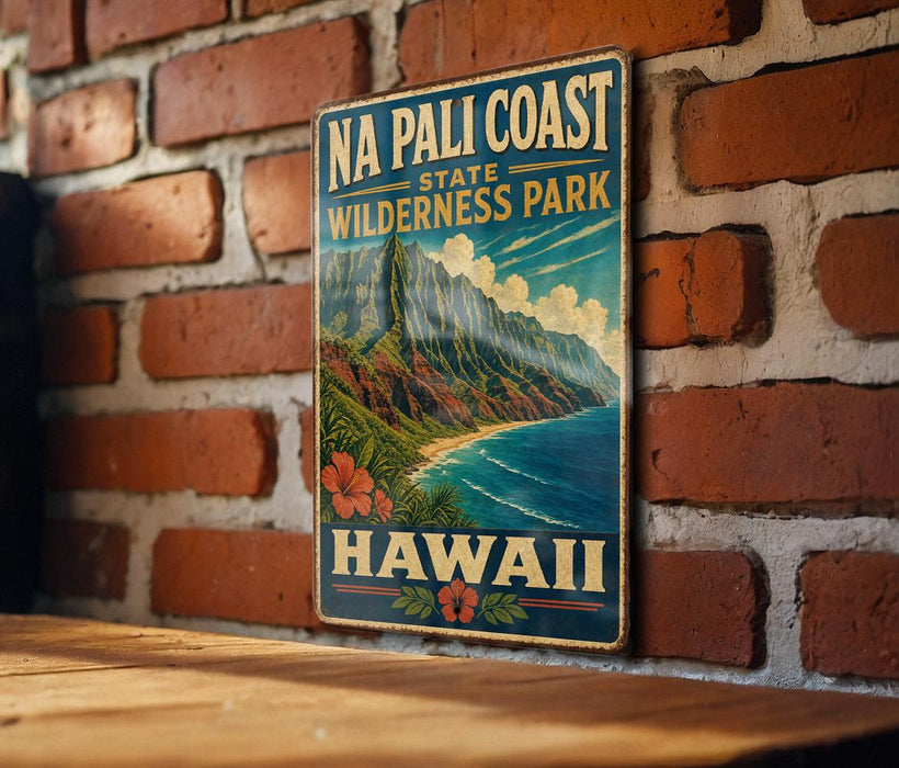A vintage-style metal sign displaying the text "NA PALI COAST STATE WILDERNESS PARK HAWAII" with a mountain landscape and ocean scene.