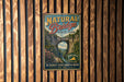 A vintage-style metal sign for Natural Bridge State Park in Virginia, featuring a scenic image of the bridge and surrounding landscape.
