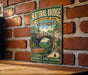 A vintage-style sign for the Natural Bridge State Resort Park in Kentucky, featuring a scenic illustration of the bridge surrounded by lush greenery.