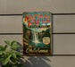 A vintage-style sign for Natural Falls State Park in Oklahoma, featuring a waterfall and lush greenery.