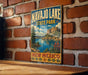 A vintage metal sign for Navajo Lake State Park in New Mexico, featuring a scenic landscape with a lake, mountains, and desert.