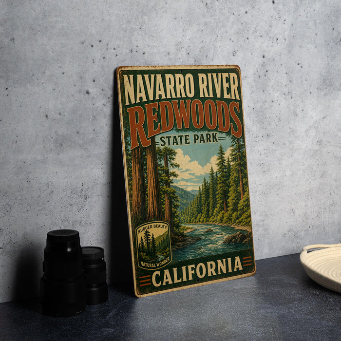 A vintage-style sign for Navarro River Redwoods State Park in California, featuring a scenic illustration of the park's natural surroundings.