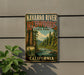 A vintage-style sign for Navarro River Redwoods State Park in California, featuring a scenic illustration of the park's natural surroundings.