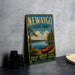 A vintage-style metal sign for New Waygo State Park, Michigan, featuring a scenic image of a canoe on a lake surrounded by pine trees.