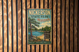 A vintage-style metal sign for Nickerson State Park in Massachusetts, featuring a scenic landscape with a lake, pine trees, and a sign indicating various activities available at the park.