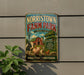A vintage metal sign for Norristown Farm Park, featuring illustrations of farm animals and a barn, mounted on a wall.