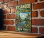 A vintage-style metal sign for the New York State Park, featuring a scenic landscape with a waterfall and flowers.
