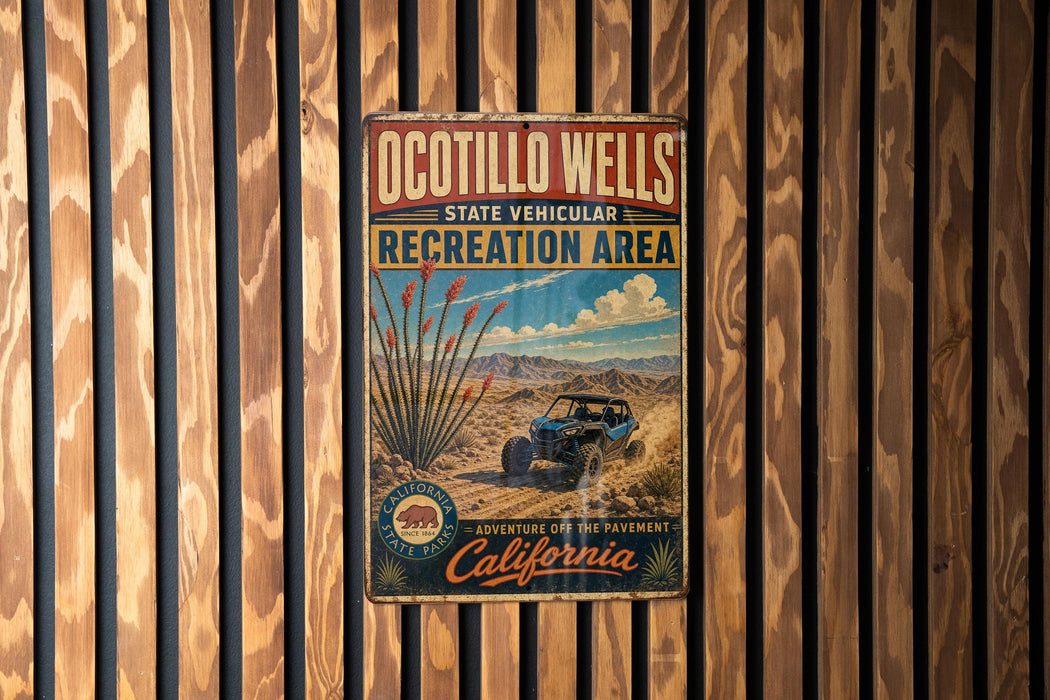 a vintage-style metal sign for Ocotillo Wells State Vehicular Recreation Area, with a desert landscape and a blue off-road vehicle.