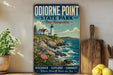 A vintage-style sign for Odionne Point State Park in New Hampshire, featuring a lighthouse and a coastal landscape with waves crashing against the rocks.