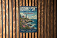 A vintage metal sign for Odionne Point State Park in New Hampshire, featuring a lighthouse and a coastal landscape.