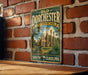 A vintage-style metal sign for Old Dorchester State Historic Park in South Carolina, featuring an illustration of the historic site with palm trees and other landmarks.