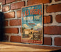 A vintage-style metal sign for Old Las Vegas Mormon Fort in Nevada, featuring an illustration of a wagon and a sign that says "A STEP BACK IN TIME".