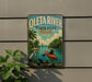 A vintage-style metal sign for Oleta River State Park, Florida, featuring a person kayaking on the river and palm trees in the background.