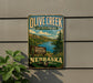 A vintage-style sign for Olive Creek State Recreation Area in Nebraska, featuring a scenic landscape with mountains, trees, and a lake.