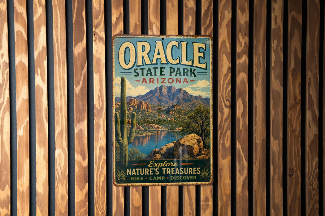 A vintage metal sign for Oracle State Park in Arizona, featuring a scenic mountain landscape with a cactus and a lake.