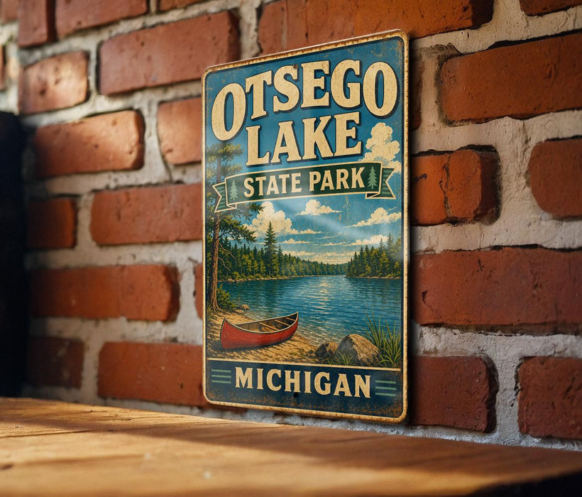 A vintage-style metal sign for Otsego Lake State Park in Michigan, featuring a scenic illustration of a lake with a canoe and surrounding forest.