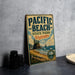 A vintage-style sign for Pacific Beach State Park in Washington, featuring a scenic beach landscape with mountains in the background.