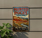 A vintage-style metal sign for Painted Rocks State Park in Montana, featuring a scenic mountain landscape.