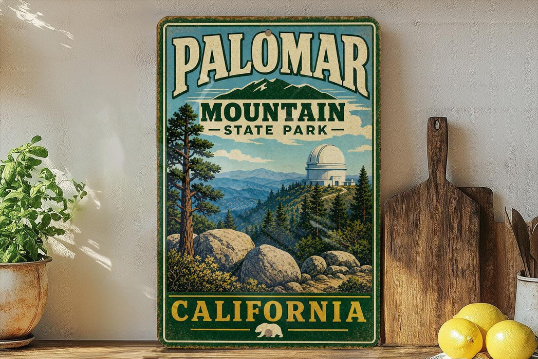 A vintage-style sign for Palomar Mountain State Park in California, featuring a scenic landscape with mountains, trees, and a dome-shaped building.