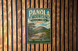 A vintage metal sign for Panola Mountain State Park in Georgia, featuring a scenic illustration of the mountain landscape.