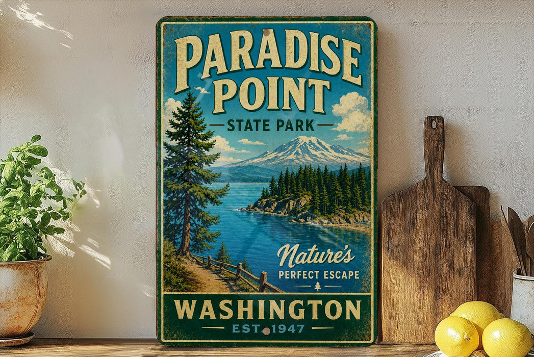 A vintage-style sign for Paradise Point State Park in Washington, featuring a scenic landscape with a mountain, pine trees, and a lake.