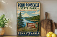 A vintage-style metal sign for Penn-Roosevelt State Park in Pennsylvania, featuring a scenic landscape with a lake and mountains.