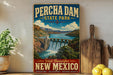 A vintage-style poster advertising Percha Dam State Park in New Mexico, featuring a scenic waterfall and mountains.