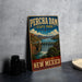A vintage-style metal sign for Percha Dam State Park in New Mexico, featuring a scenic illustration of the dam and surrounding landscape.