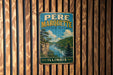 A vintage metal sign for the state park of Illinois, featuring a scenic landscape with a river and mountains.