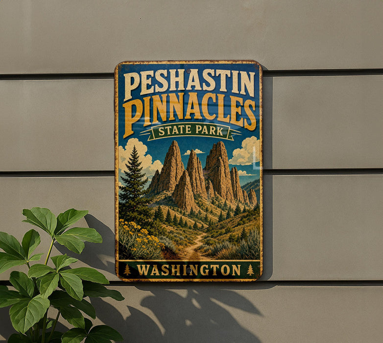 A vintage-style metal sign for Peshtin Pinnacles State Park in Washington, featuring a scenic mountain landscape.