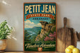 A vintage-style sign for Petit Jean State Park in Arkansas, featuring a scenic landscape with a cliff and a river.