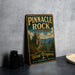 A vintage-style metal sign for Pinnacle Rock State Park in West Virginia, featuring a scenic mountain landscape.