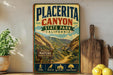 A vintage-style metal sign for Placerita Canyon State Park, California, featuring a scenic mountain landscape and trail information.