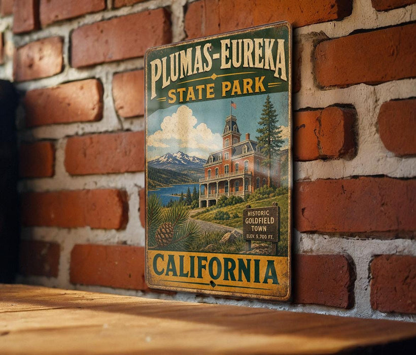A vintage metal sign for Plumas-Eureka State Park in California, featuring a scenic illustration of a historic building and mountains.
