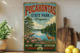 a vintage-style sign for Pocahontas State Park, Virginia, with a scenic illustration of a river, trees, and a deer. The sign also includes the words "NATURE, HISTORY, RECREATION" and "VIRGINIA" in a decorative font.