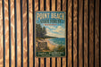 A vintage metal sign for Point Beach State Forest in Wisconsin, featuring a scenic image of a beach and pine trees.
