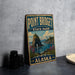 A vintage-style sign for Point Bridge State Park in Alaska, featuring a scenic landscape with mountains, water, and a large rock formation.