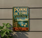 A vintage-style sign for Pomme De Terre State Park in Missouri, featuring a scenic landscape with a lake, mountains, and flowers.