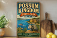 A vintage-style metal sign for POSSUM KINGDOM STATE PARK, TEXAS, featuring an illustration of a lake, cliffs, and a small boat.